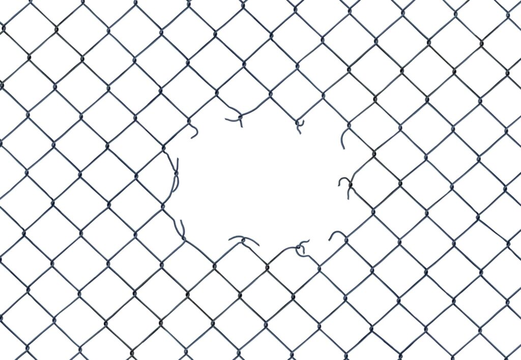 Hole In A Chain-Link Fence